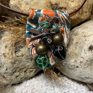 Mokume Gane polymer clay cool beads and a leather cord. LL2C N 107